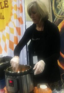 Meg Barnhart, founder of the Zen of Slow Cooking, makes a bean soup in an Instant Pot at the Good Food Expo in Chicago. Jodie Jacobs photo.