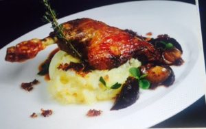 Confit duck leg on thyme with mashed potatoes, cabbage and beet root. (White Horse menu photo)