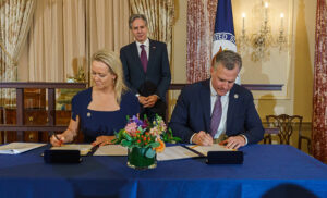 James Beard Foundation CEO Clare Reichenbach and Chief of Protocal Ambassador Rufus Gifford sign the memorandum of understanding as Secretary of State Anthony Blinken oversees the proceeding (photo: Ronny Przysucha).
